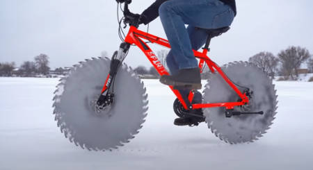 Ice-biker mods his cycle with buzz-saw wheels (crazy projects).